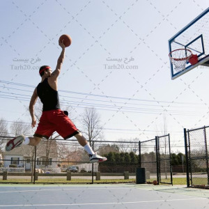 تصویر استوک ورزش بسکتبال و پرتاب بازیکن
