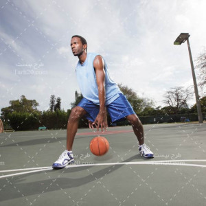 تصویر با کیفیت بازیکن بسکتبال در حال بازی